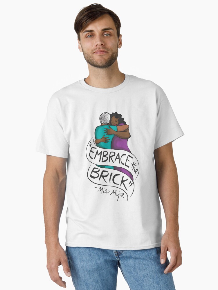 Thumbnail 2 of 7, Classic T-Shirt, "Embrace the Brick" - Miss Major - Art by Micah Bazant designed and sold by houseofgg.