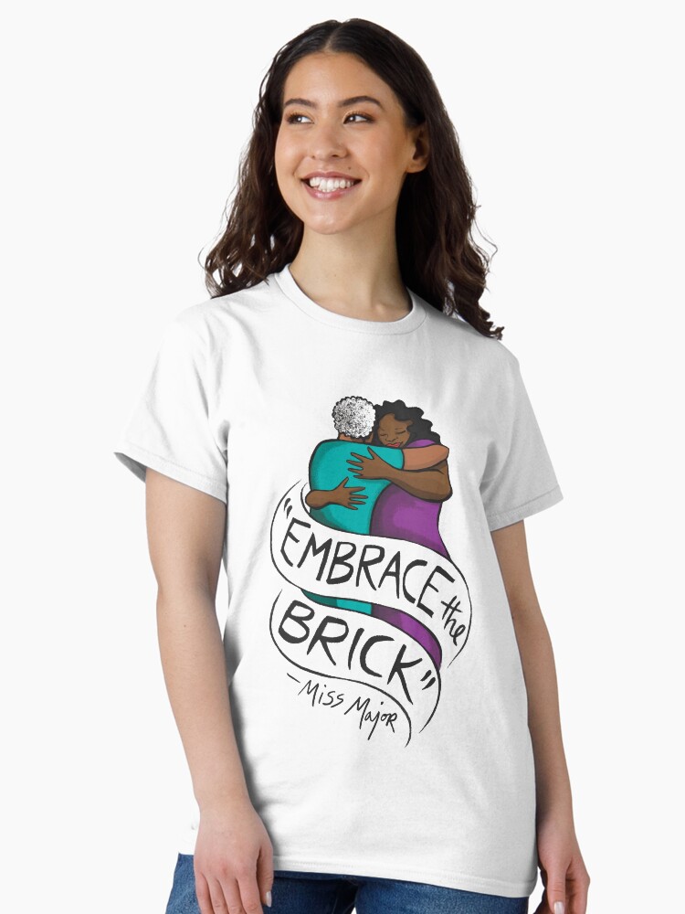 Thumbnail 1 of 7, Classic T-Shirt, "Embrace the Brick" - Miss Major - Art by Micah Bazant designed and sold by houseofgg.