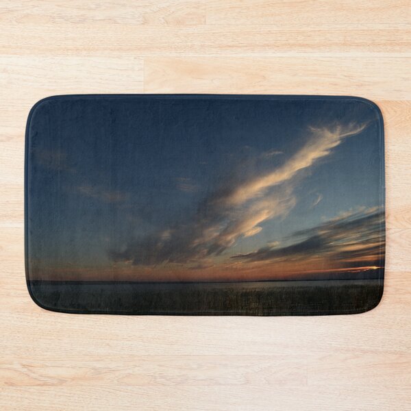 Item preview, Blue sky at sunset with a cloud falling into the lake in glittering in the twilight glow designed and sold by yarvin13.