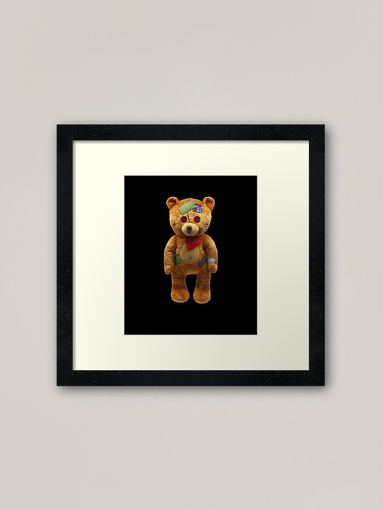 small black teddy bear