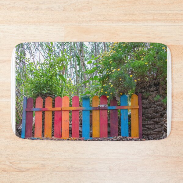 Item preview, Multi-colored fence strips and wickets at the entrance to an overgrown garden. Vintage designed and sold by EG Creativity Art.