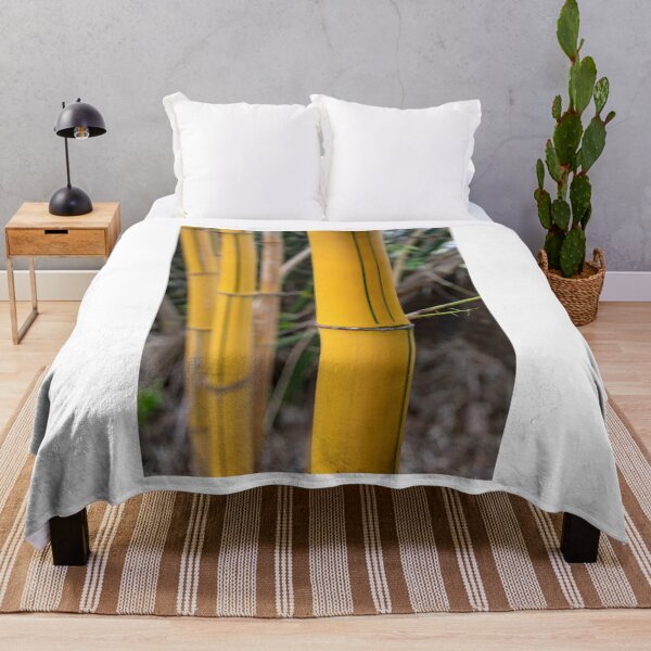 Artikelvorschau, Yellow bamboo trunks close-up on a blurred background entworfen und verkauft von EG Creativity Art.