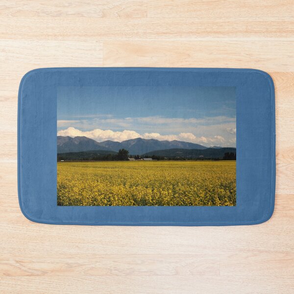 Item preview, Canola fields in bloom against the Swan Mountain range in the Rocky Mountains of Montana  designed and sold by LCAppling.
