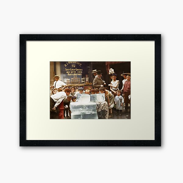 Licking blocks of ice during heat wave in New York, July, 1911 Framed Art Print