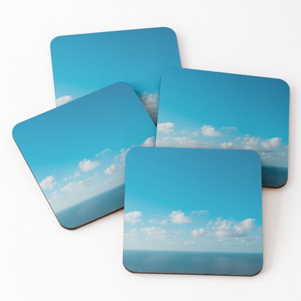 Item preview, blue sky above ocean panorama with white clouds designed and sold by ohaniki.