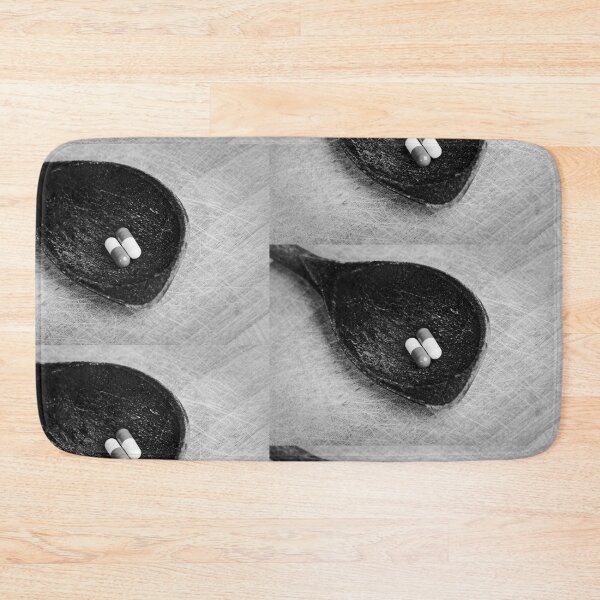 Item preview, Capsules taplets pill on wooden spoon close up, painkiller concept designed and sold by Claraveritas.