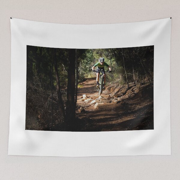 Item preview, Mountain Biker getting air on a dark single track designed and sold by Dan Edwards.