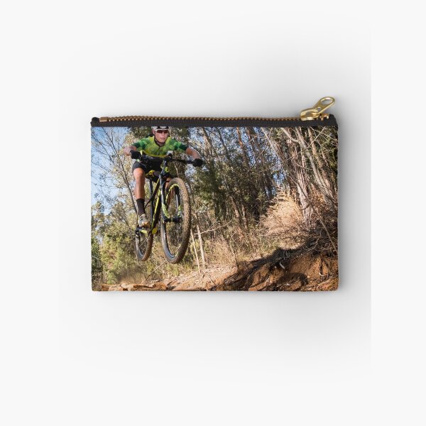 Item preview, Mountain biker getting air on a single track designed and sold by Dan Edwards.