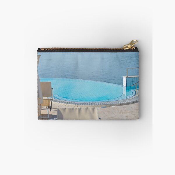 Item preview, Empty infinity pool on the sunrise, quiet bue sea designed and sold by anytka.