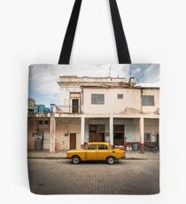 Bright yellow vintage car in La Havana, Cuba. Tote Bag