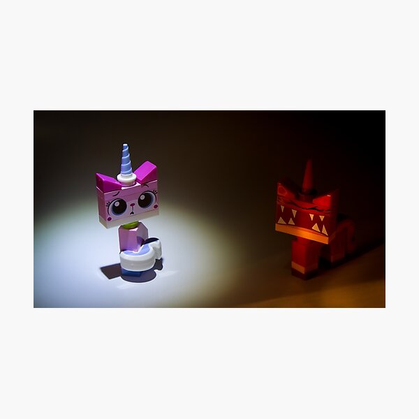 The 2 faces of Unikitty Photographic Print