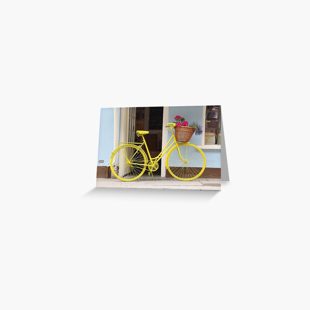 vintage yellow bike with basket