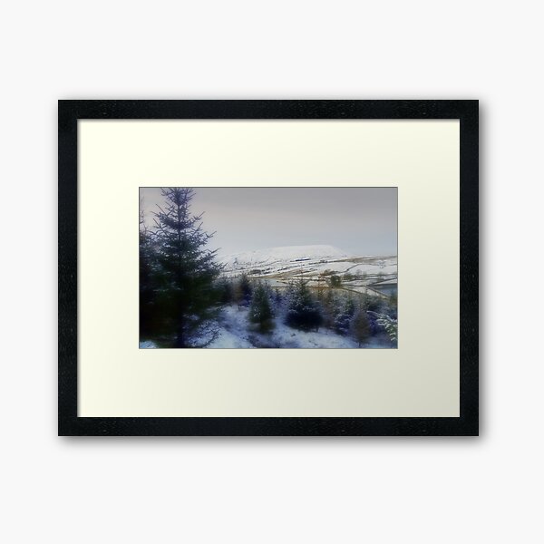 pendle hill in winter. Framed Art Print