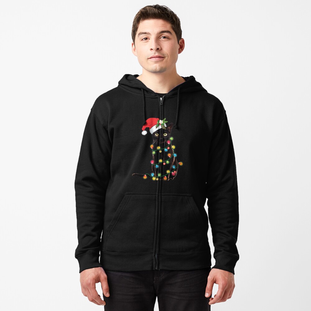 Discover Santa Black Cat Tangled Up In Christmas Tree Lights Holiday Zipped Hoodie