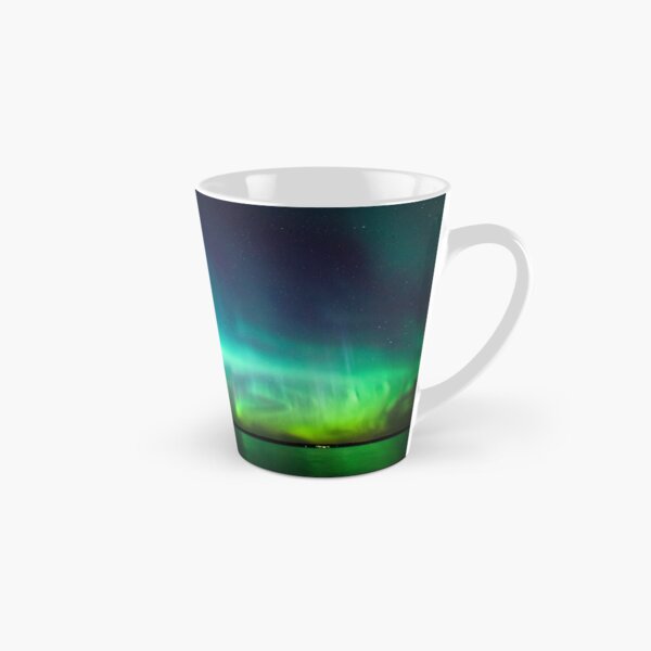 Northern lights glow over lake Tall Mug