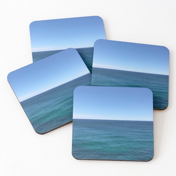 Item preview, Tranquil view of ocean against blue sky designed and sold by Screamingsun.