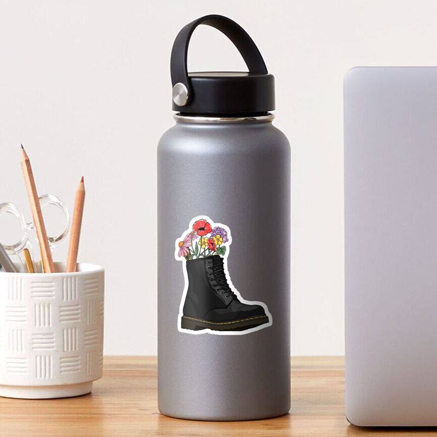 flowers growing from doc marten boot Sticker