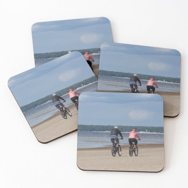 Item preview, man and woman cycling on a beach designed and sold by mrivserg.