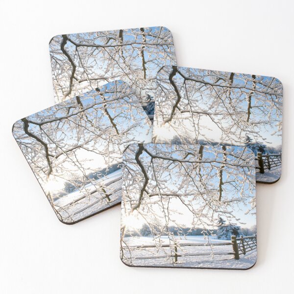 Item preview, A bright winter scene with sunburst shining through snow covered tree branches and a wooden fence and gate in a country scene.United Kingdom  designed and sold by Tony Skerl.