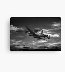 Lancaster Bomber On Night Raid Canvas Print