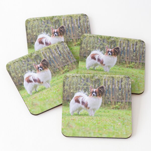 Item preview, Portrait of a papillon purebreed dog standing on the grass designed and sold by anytka.