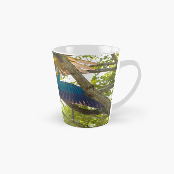 A pair of macaws have a tussle Tall Mug