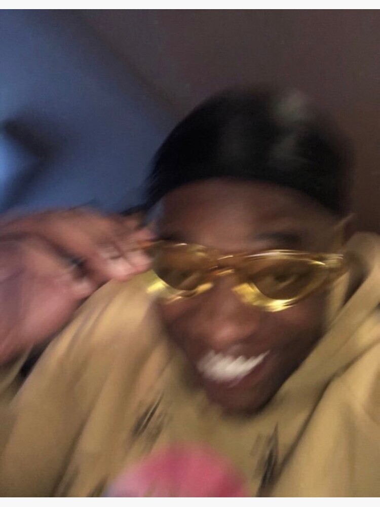 Smiling shaking yellow glasses meme