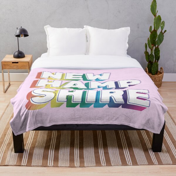 Item preview, New Hampshire rainbow typography LGBT designed and sold by Seven-Stripes.