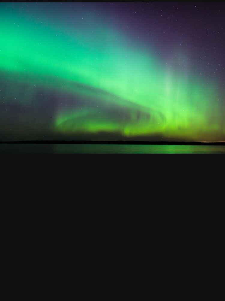 Northern lights over lake in Finland by Juhku