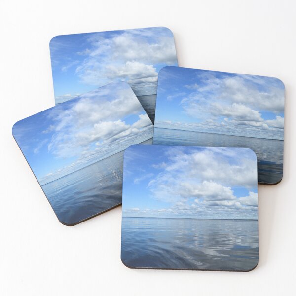 Item preview, beautiful seascape clouds reflected in blue water designed and sold by mrivserg.