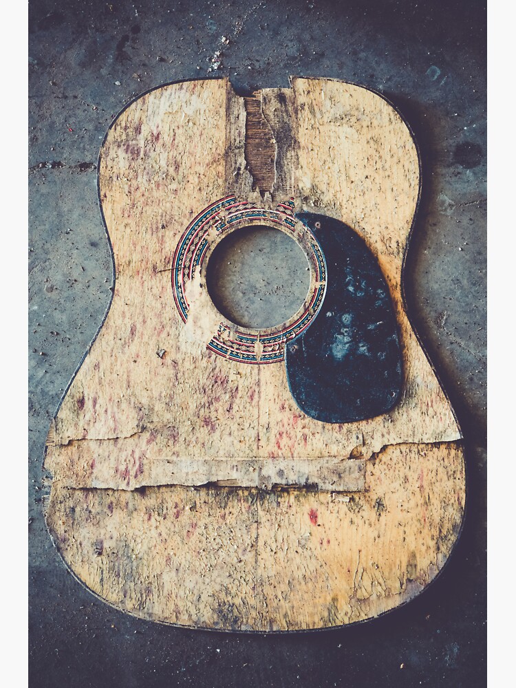 Broken acoustic guitar by Juhku