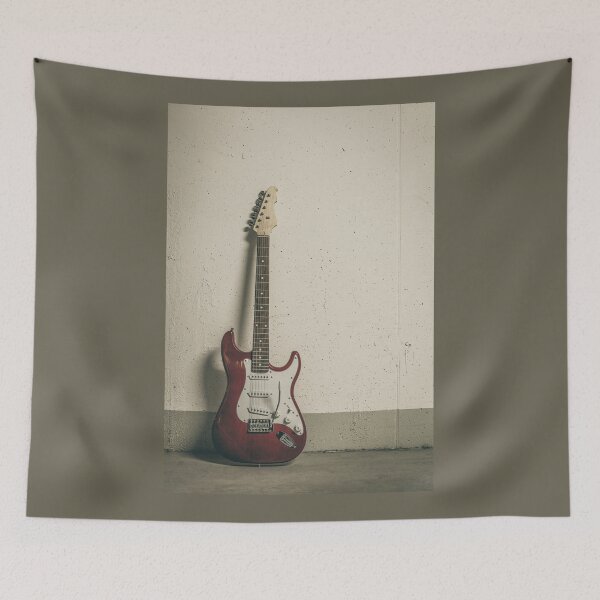 Item preview, Red electric guitar standing against white raw wall designed and sold by Lukasz Szczepanski.