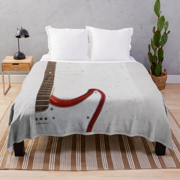 Item preview, Red electric guitar close-up against white raw wall designed and sold by Lukasz Szczepanski.