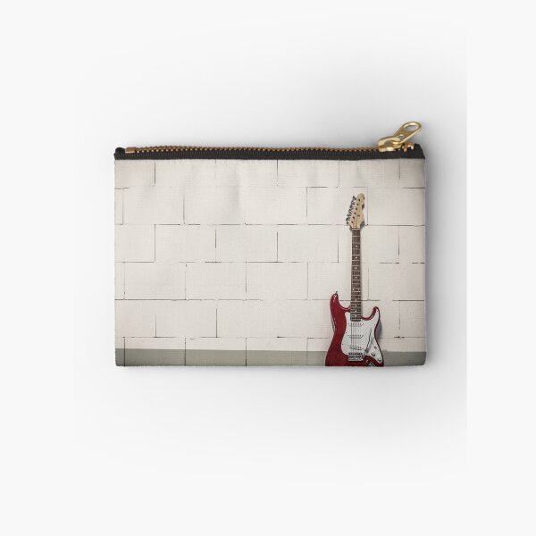 Item preview, Red electric guitar against white brick wall designed and sold by Lukasz Szczepanski.