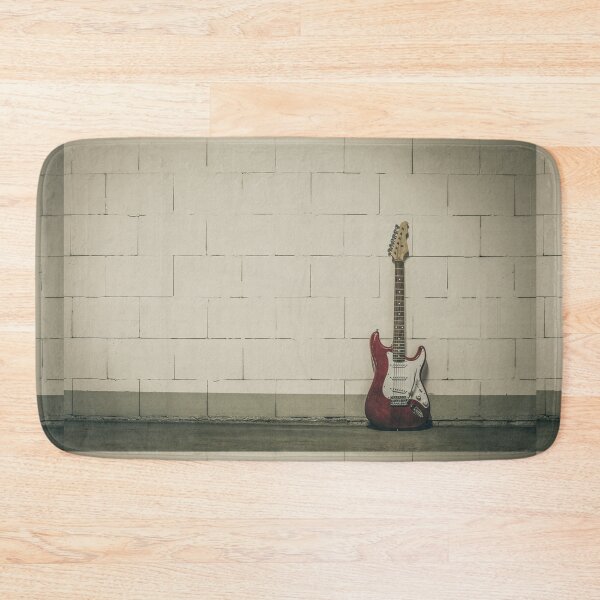 Item preview, Red electric guitar against white brick wall designed and sold by Lukasz Szczepanski.