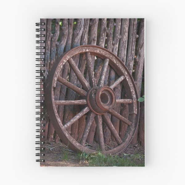 Item preview, Broken wagon wheel leaning against a stick fence designed and sold by Allen Penton.