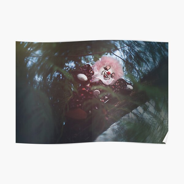 Smiling clown hiding in a tree Poster