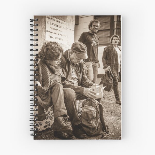 Item preview, Checking the evening programme  designed and sold by Clare Colins.