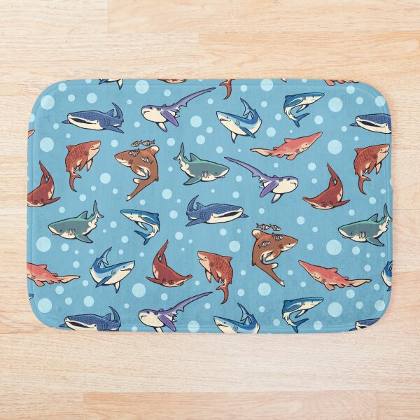 Sharks in the light blue Bath Mat