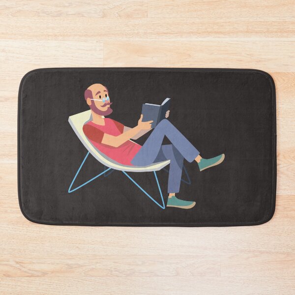 Item preview, bald man sitting and reading a book on vacation designed and sold by duxpavlic.