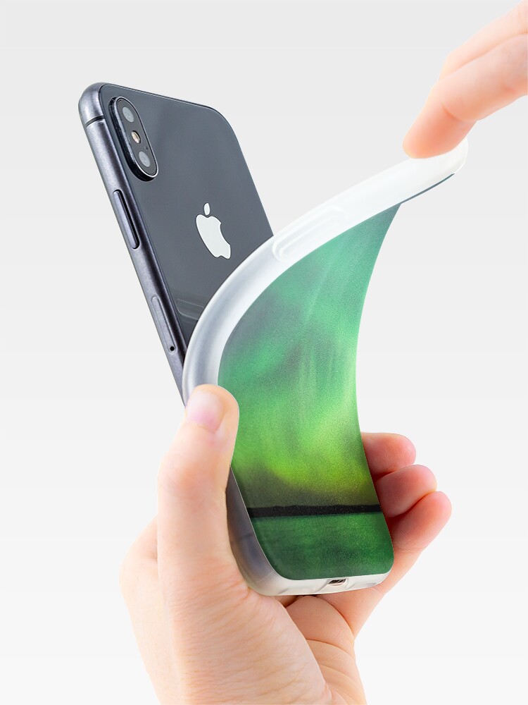 Alternate view of Northern lights over lake in Finland iPhone Case & Cover