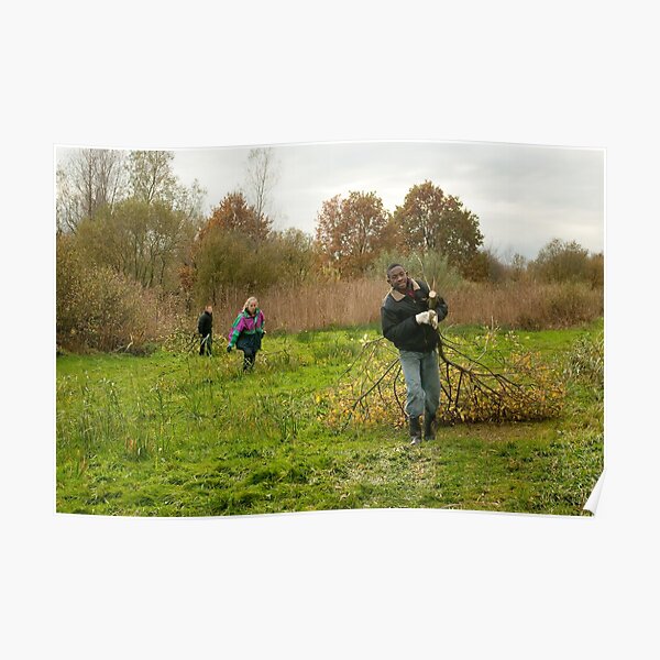Young volunteers at work in nature Poster