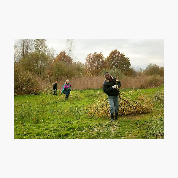 Young volunteers at work in nature Photographic Print