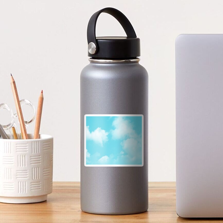 Cute puffy small white clouds on a sunny aqua blue sky Water Bottle by  ARTbyJWP