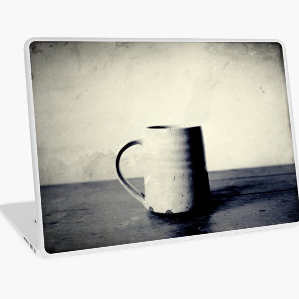 Tasse kaffee auf einem Tisch Laptop Folie