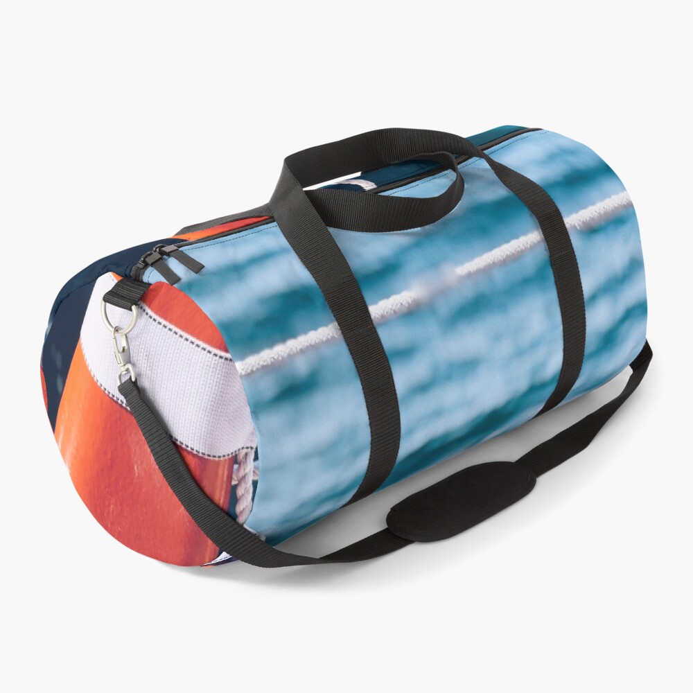 Seas The Day on a duffle bag