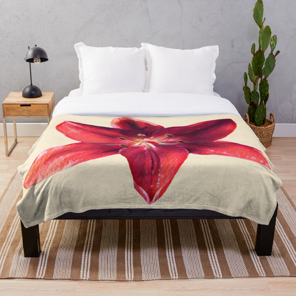 Red Lily Bloom on a throw blanket