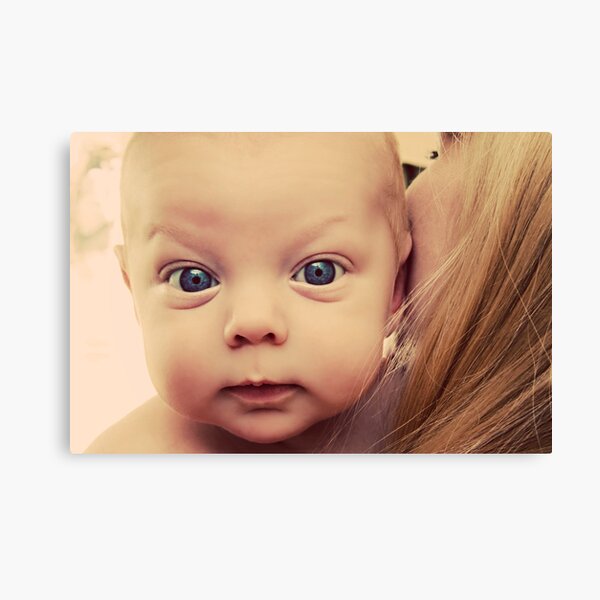 A baby face... Canvas Print