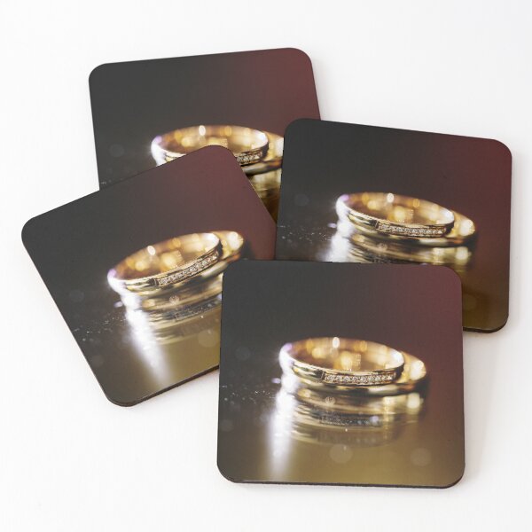 Item preview, Close-up of wedding golden rings on dark background designed and sold by dariazu.