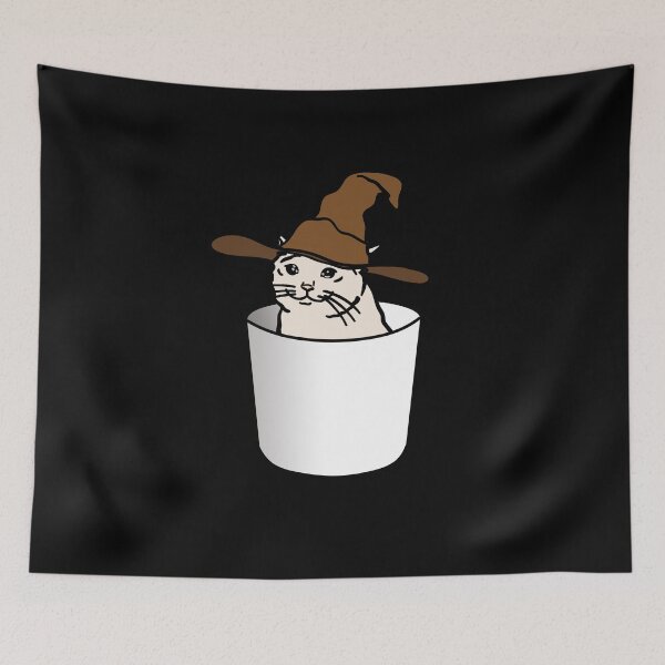 Item preview, Crying Cat Meme in a Wizard Hat Sitting in a Glass designed and sold by plumpjose.